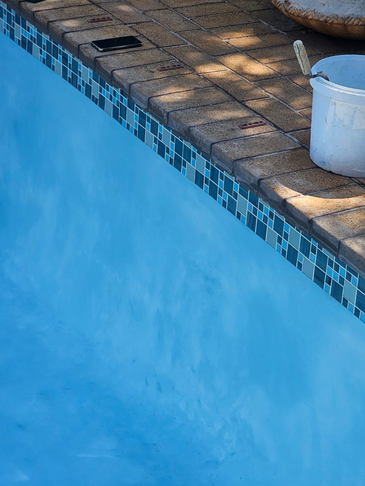 Marbelite renovation with new Glass Mosaics in Turquoise Ocean MIx